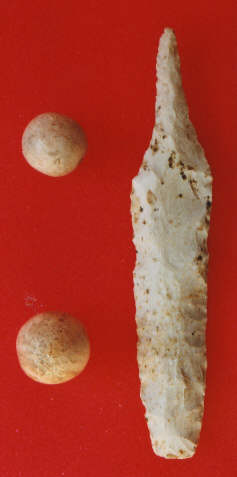 drill made from a reworked Nebo Hill point and two stone game balls found in Adair County, Missouri